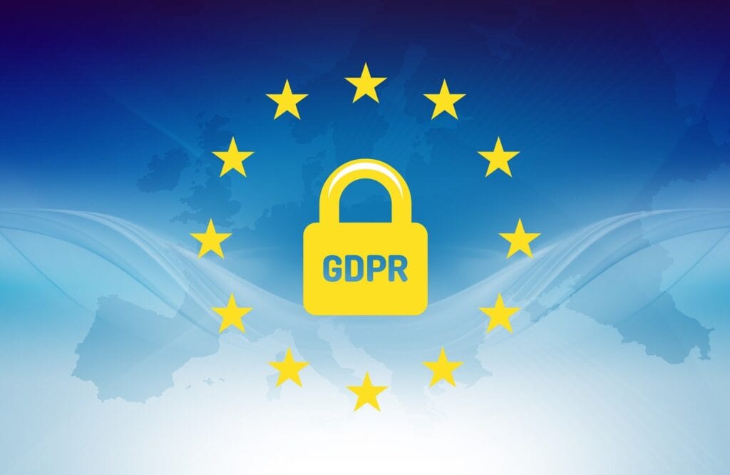Europe map background with “GDPR“ padlock inside circle of EU stars