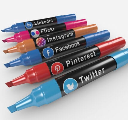 This image is of a row of colorful markers with each one containing a different social media logo printed on them.