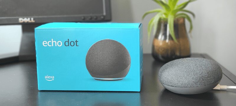 A picture of Amazon's echo dot smart speaker and Google Home mini smart speaker